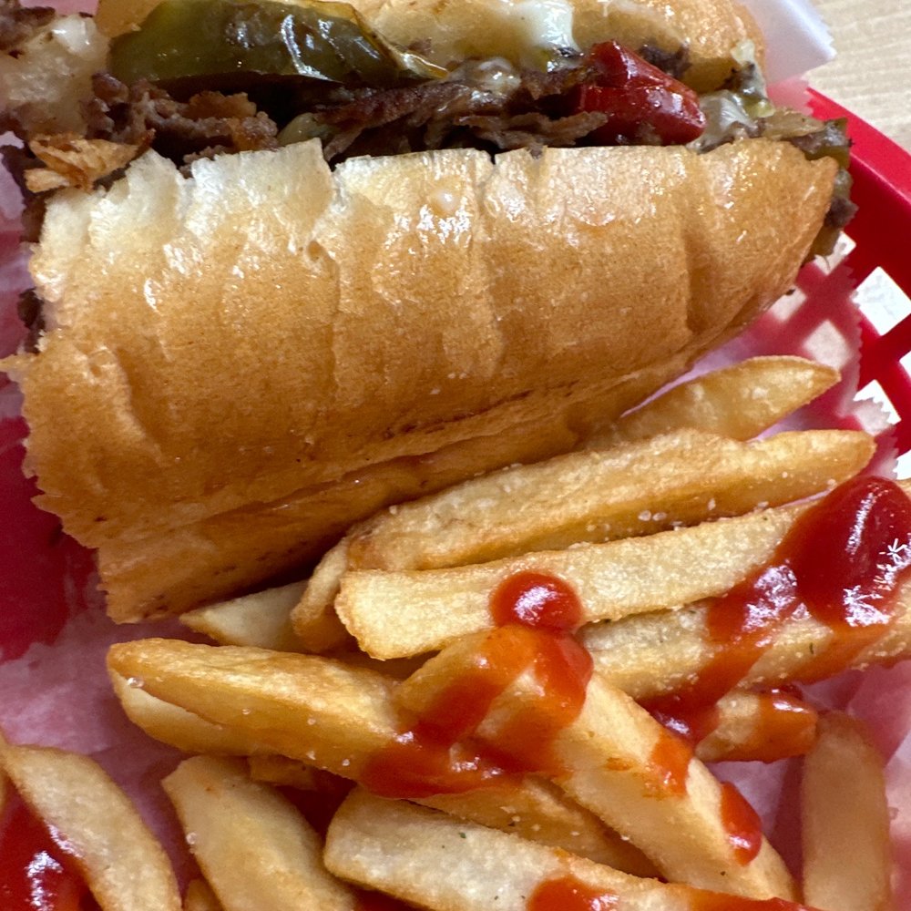 Cheese steak and fries Cheese steak and fries