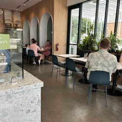 Honest Mary's - Dining tables in pretty archways