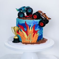 Lyndsay’s Cakery - Monster truck theme with chocolate/vanilla marble cake inside with buttercream icing.