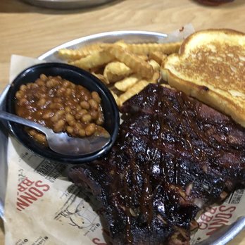 Sonny's BBQ - St. Louis Ribs with fries and baked beans - Barbeque Near Me - Orlando, Florida Sonny's BBQ - St. Louis Ribs with fries and baked beans - Barbeque Near Me - Orlando, Florida