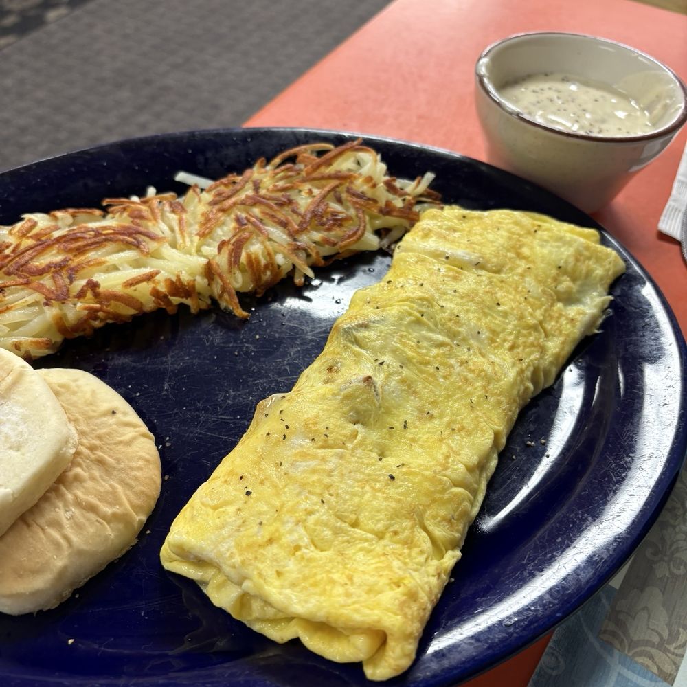 I had the ham and cheese omelette, hashbrowns, and a side of their sausage gravy with a biscuit. I had the ham and cheese omelette, hashbrowns, and a side of their sausage gravy with a biscuit.