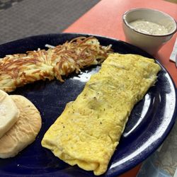 Portage Cafe - I had the ham and cheese omelette, hashbrowns, and a side of their sausage gravy with a biscuit.