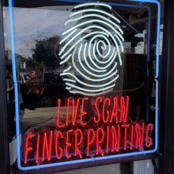 Tarrell Live Scan & Notary - You can't miss our fingerprint sign on the window of our office.
