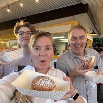 Ono’s Malasadas - Happy consumers of Malasada ice-cream sandwiches outside Ono's Hawaiian donut store in Provo, UT. Run, don't walk!!! - Donuts Near Me - Provo, Utah