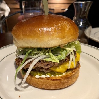 Krueger's Tavern - Krueger's Burger  two house-blend patties, shredded lettuce, onion, American cheese, special sauce, pickle, dijonnaise, brioche bun - Bars Near Me - Cincinnati, Ohio