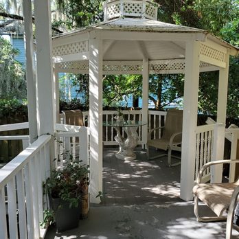 Tybee Island Inn - Just off the porch, one of many areas to relax and enjoy some peace. - Bed & Breakfast Near Me - Tybee Island, Georgia Tybee Island Inn - Just off the porch, one of many areas to relax and enjoy some peace. - Bed & Breakfast Near Me - Tybee Island, Georgia