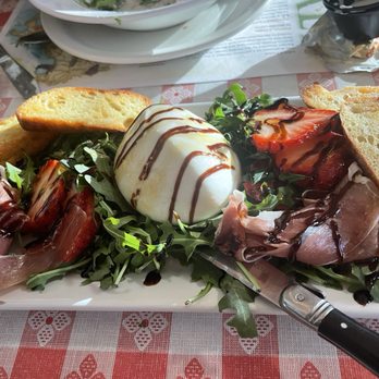 Dinucci's Italian Dinners - Burrata, prosciutto, toast points, strawberries and balsamic drizzle - Italian Near Me - Valley Ford, California Dinucci's Italian Dinners - Burrata, prosciutto, toast points, strawberries and balsamic drizzle - Italian Near Me - Valley Ford, California