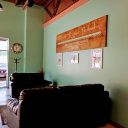 Sugar Rose Bakeshop - Interior is cute!  Tables to the left (not shown here).  Lots of windows.