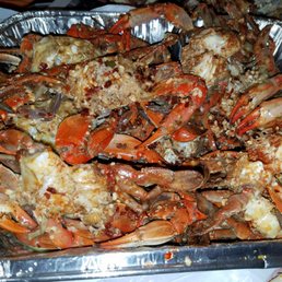 a tray of cooked crabs a tray of cooked crabs