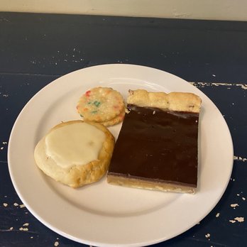 Winslow's Table - A trio from the bakery. Goat cheese cookie, confetti cookie sandwich and a Winslow Bar. - New American Near Me - University City, Missouri Winslow's Table - A trio from the bakery. Goat cheese cookie, confetti cookie sandwich and a Winslow Bar. - New American Near Me - University City, Missouri