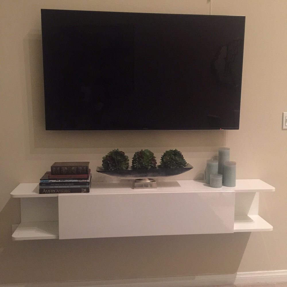 Nice TV amount and floating shelve! It looks too legit. Nice TV amount and floating shelve! It looks too legit.