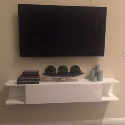 Nice TV amount and floating shelve! It looks too legit.