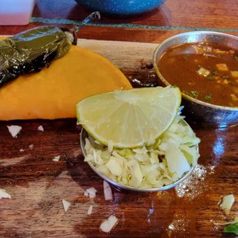 Amelias Mexican Kitchen - Birria taco with sauce. - Mexican Near Me - Tucson, Arizona
