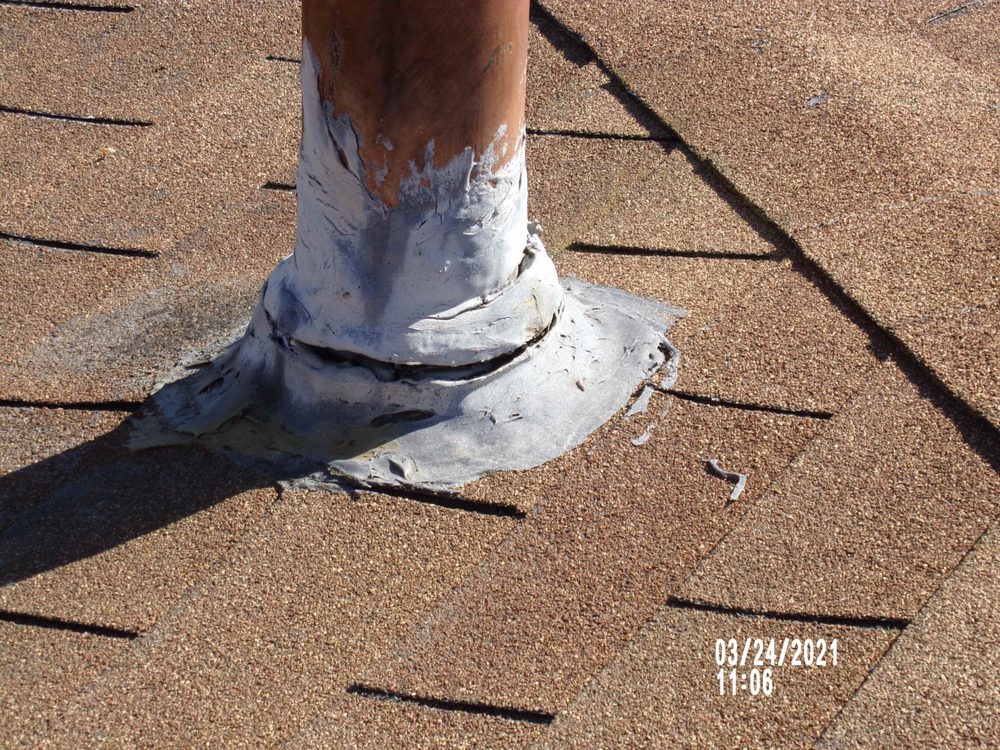 Slide of Tom Byer Roofing Service