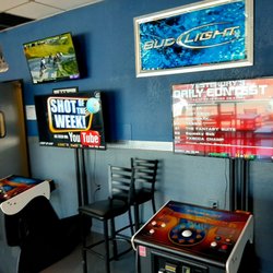 The Track Grill and Bar - Adult game room: Golf! Tee up & play.