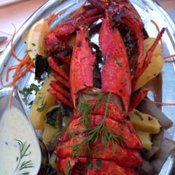 Hummer (immer am Freitag)- vorbestellen empfohlen! Mit einer sehr guten Champagner-Sauce ! Auf Erdäpfel und Mangold