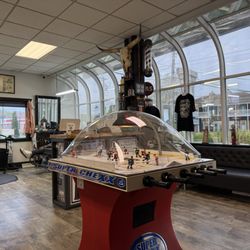 Gas Up Barber Shop & Shave - Inside the barber shop - has cool games to play while you wait!