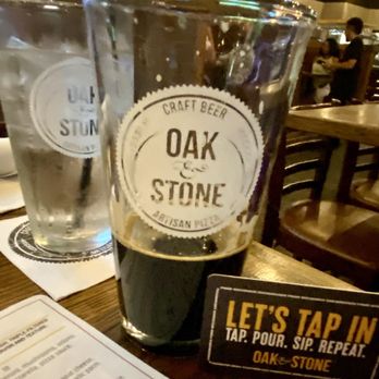 Oak & Stone - Tasting different craft beers. - Pizza Near Me - Saint Petersburg, Florida
