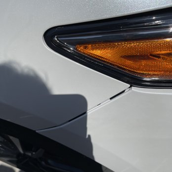 A Watkins Collision - The third time they asked for my car to repaint the bumper they broke up he's holding the bumper and then they blame it on me - Body Shops Near Me - Costa Mesa, California
