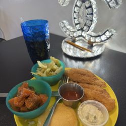 Fried Catfish, candied yams, cabbage, and cornbread.