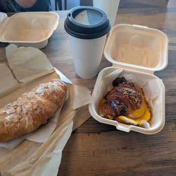 Exit Zero Coffee - Almond croissant, pretzel-croisant (egg, cheese, Canadian bacon), latte - Coffee & Tea Near Me - Las Vegas, Nevada Exit Zero Coffee - Almond croissant, pretzel-croisant (egg, cheese, Canadian bacon), latte - Coffee & Tea Near Me - Las Vegas, Nevada