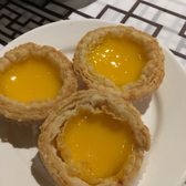 Photo of Ping's Seafood - New York, NY, United States. Egg tarts (meh)