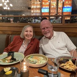 Dennis Kinnane, OMD LAc, RPh - Having dinner with a patient and her daughter who took our picture!
