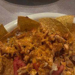 El Portal - Ordered the nachos and got a plate of chips with half melted cheese...