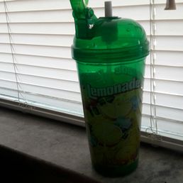 a green drink in a cup
