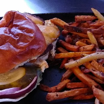 Two Bucks - The Classic burger with sage fries. - New American Near Me - Eastlake, Ohio
