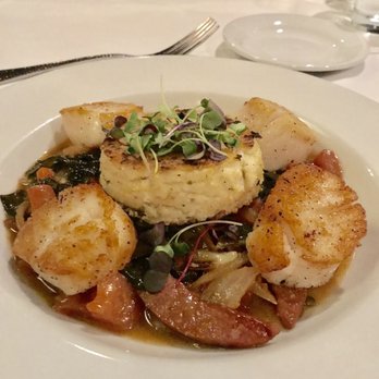 Savour - Scallops, andouille, collards and grit cake - New American Near Me - Tallahassee, Florida Savour - Scallops, andouille, collards and grit cake - New American Near Me - Tallahassee, Florida