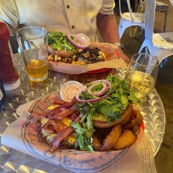 Chupacabra Kitchen - 1/2 pound mushroom Swiss with fries and 1/2 lb bacon cheeseburger with onion rings. Excellent greasy goodness! - Chicken Wings Near Me - Salado, Texas