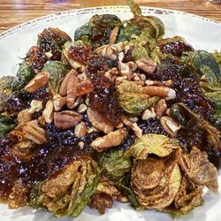 Aj's Doolittle's - Flash fried brussel sprouts tossed with pecans and their own hot pepper bacon jam. The hot pepper is spicy but not Hot.