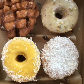 Donut Monster - Clockwise from top left: rhubarb fritter, lemon and pistachio, mango-coconut, coconut creme filled. YUMZERS. - Donuts Near Me - Hamilton, Ontario