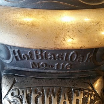 Fourth Ward School Museum - Stove in one of the classrooms. I imagine these impressive works of art churned out the heat during those bone-chilling VC winters! - Museums Near Me - Virginia City, Nevada