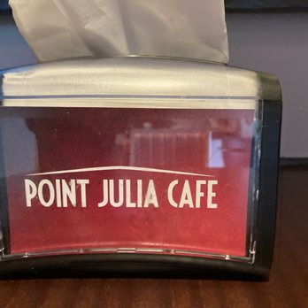 Point Julia Cafe - a tissue dispenser on a table - Coffee & Tea Near Me - Kingston, Washington