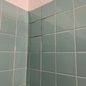 Blackwater Lodge - Mold in the grout of the shower. Gross. - Barbeque Near Me - Davis, West Virginia