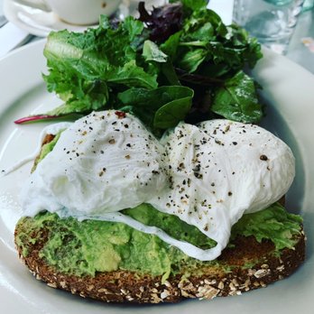 Fiat Cafe - Poached eggs on avocado mash with whole grain toast - Italian Near Me - New York, New York
