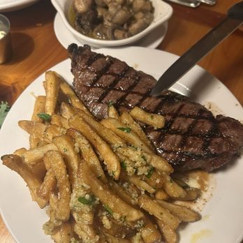 Cattlemens - Raw 14 oz. Ribeye with garlic fries and mushrooms - Steakhouses Near Me - Selma, California Cattlemens - Raw 14 oz. Ribeye with garlic fries and mushrooms - Steakhouses Near Me - Selma, California