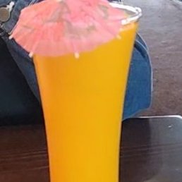 Mango lassie with a little umbrella