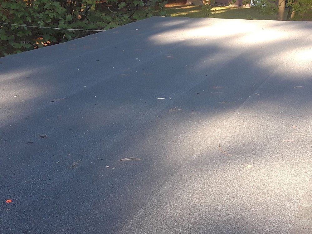 Slide of H&L Roofing