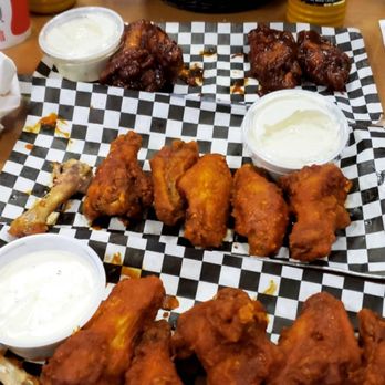 The Burger Point - BBQ, Hot Garlic, Ghost of 3 Mile Island (pretty spicy)! Wings are pretty big too! Absolutely delicious! - Burgers Near Me - Chicago, Illinois