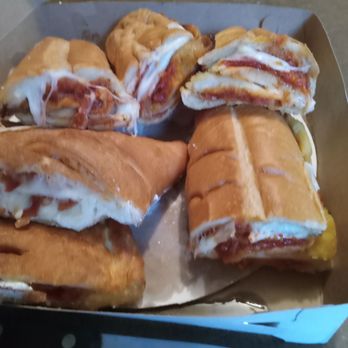 Zois Pizza Palace - Takeout, eggplant, & chicken parm grinder, also a calazone, all cut in half so we can split it - Pizza Near Me - Seymour, Connecticut Zois Pizza Palace - Takeout, eggplant, & chicken parm grinder, also a calazone, all cut in half so we can split it - Pizza Near Me - Seymour, Connecticut