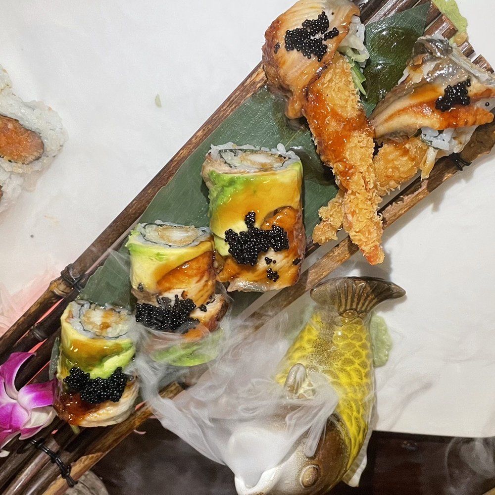 Mizu Sushi & Thai - two plates of sushi and a fork - Sushi Bars Near Me - Naples, Florida Mizu Sushi & Thai - two plates of sushi and a fork - Sushi Bars Near Me - Naples, Florida