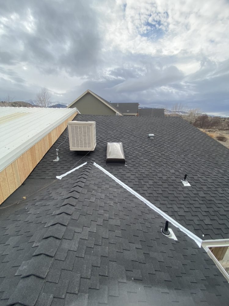 Slide of Manny's Metal Roofing