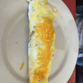 Ruby's Kitchen At Masons - an omelet on a plate - Southern Near Me - Goodlettsville, Tennessee Ruby's Kitchen At Masons - an omelet on a plate - Southern Near Me - Goodlettsville, Tennessee