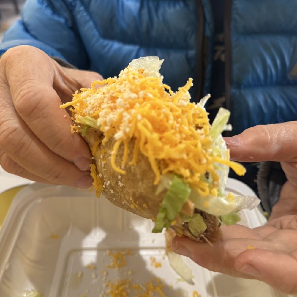 This is what the taco looked like. My dad got extra cheese, their cheese is so good!