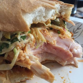 Lonesome Rose - Logan Square - Raw chicken in the fried chicken torta. - Bars Near Me - Chicago, Illinois Lonesome Rose - Logan Square - Raw chicken in the fried chicken torta. - Bars Near Me - Chicago, Illinois