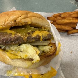 Giant Hamburgers - Flat top grilled, giant cheese burger with green chilies! Oh...and really good fries
