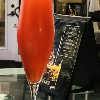 Gruene Tini's - Flirtini  Smirnoff strawberry vodka, cranberry juice, with a champagne top. - Lounges Near Me - New Braunfels, Texas